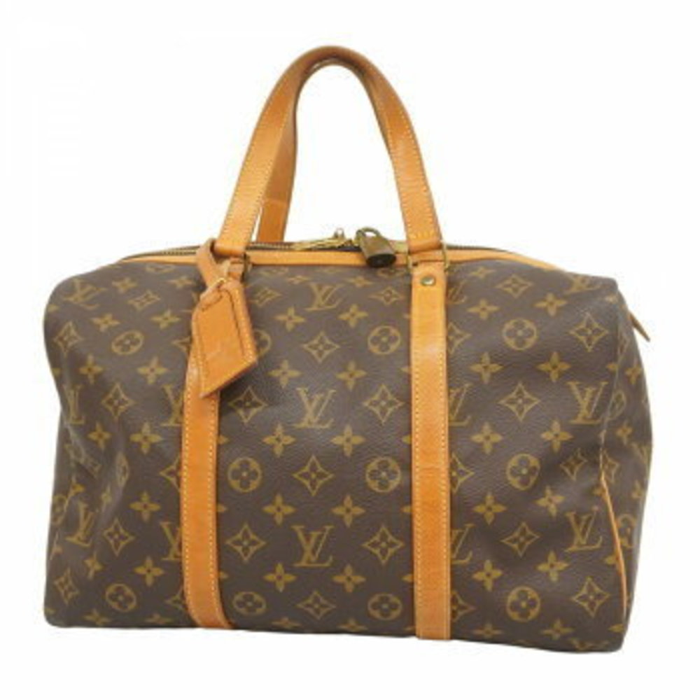 Louis Vuitton Monogram Sax Souple Handbag Brown